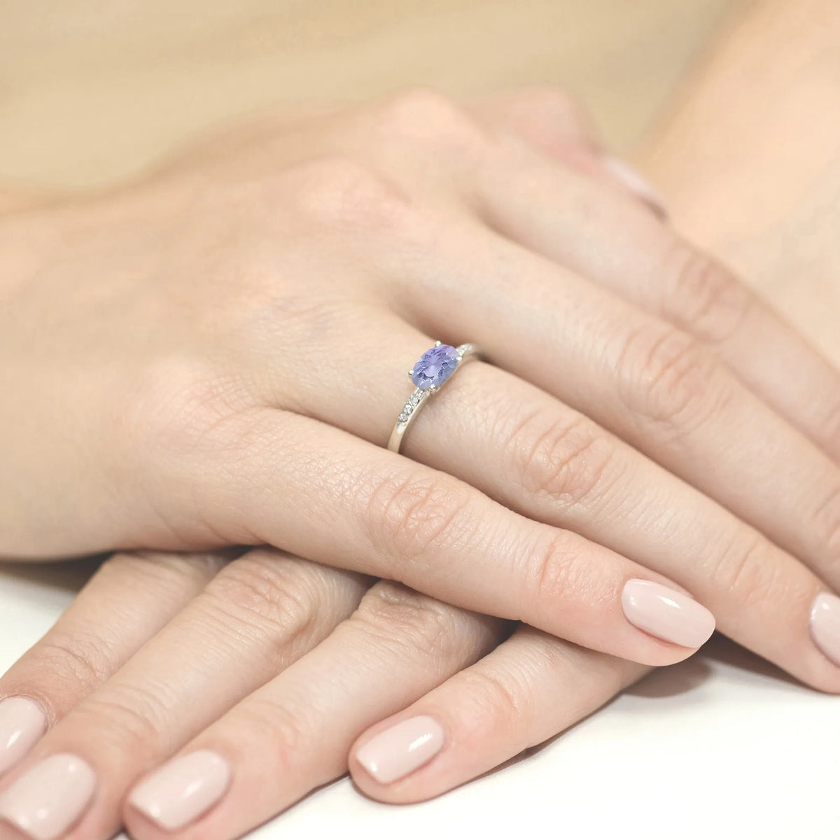 gold-ring-with-0-40ct-tansanit-and-0-03ct-diamonds-w0077-tap-01