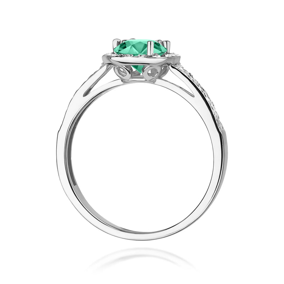 Weißgoldring mit 0,50 ct Smaragd und 0,20 ct Diamanten