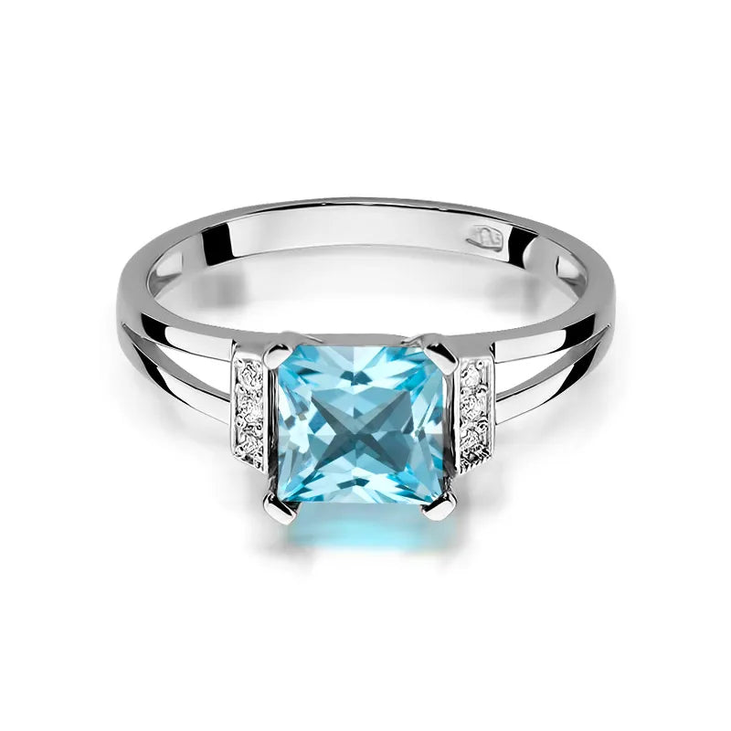 zlatý prsten s topazem 1,40 ct a diamanty 0,03 ct w0103-tob-01