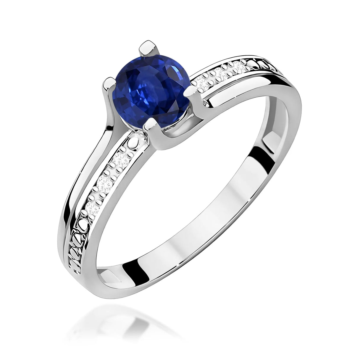 Halo prsteň z bieleho 14k zlata s okrúhlym modrým zafírom 0,50 ct a diamantmi 0,03 ct