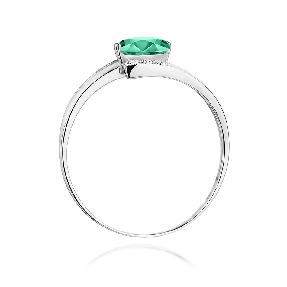 Bague en or blanc avec émeraude 0,40 ct et diamants 0,052 ct