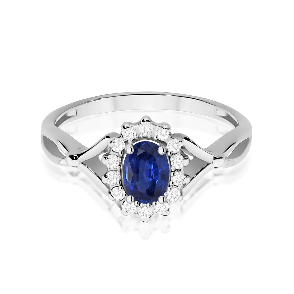 Prsten z bílého zlata se safírem 0,70 ct a diamanty 0,12 ct