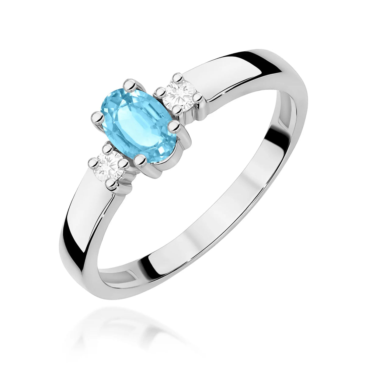 Prsteň s tromi kameňmi z bieleho 14k zlata s oválnym topásom Swiss Blue 0,50 ct a diamantmi 0,08 ct