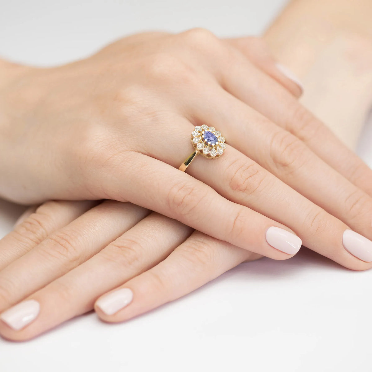gold-ring-with-0-40ct-tansanit-and-0-103ct-diamonds-w0354-tap-01