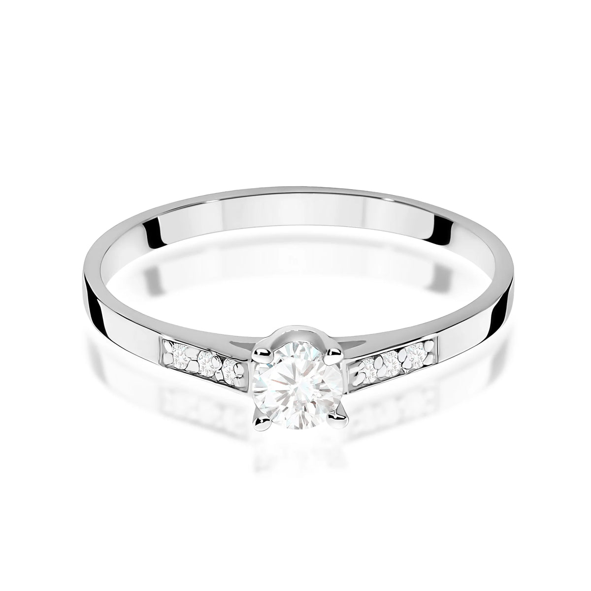 Výrazný prsten z bílého zlata ryzosti 585 s kulatým diamantem 0,15 ct a diamanty 0,06 ct
