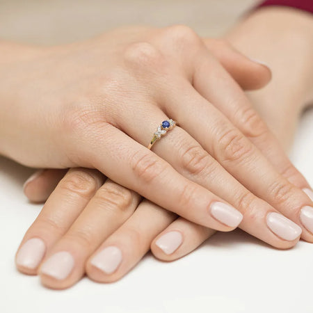 gold-ring-with-0-15ct-sapphire-and-0-02ct-diamonds-w0414-sab-01