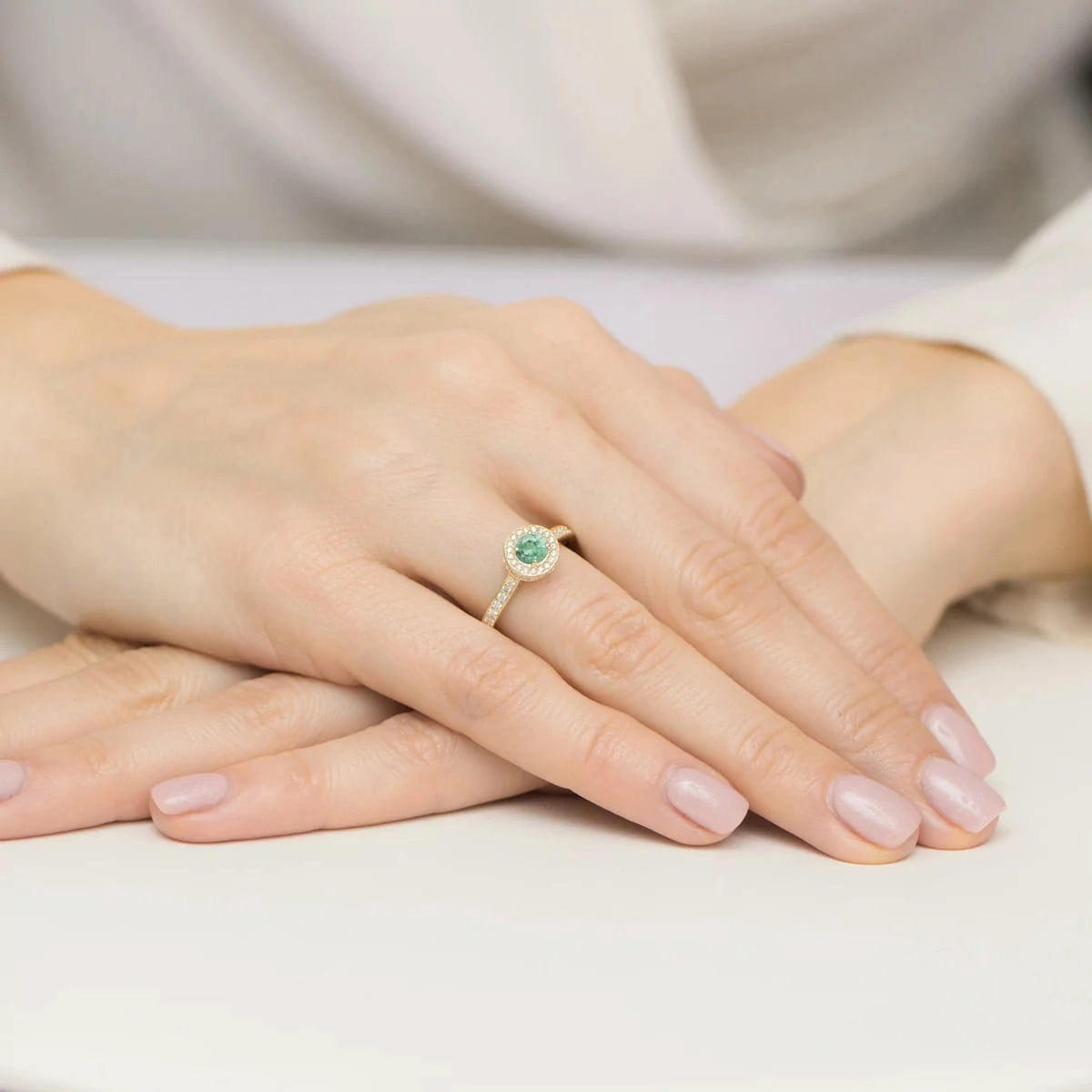 gold-ring-with-0-30ct-emerald-and-0-343ct-sideline-diamonds-w0559-emg-01