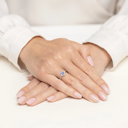 gold-ring-flower-with-0-50ct-tansanit-and-diamonds-w0603-tap-01