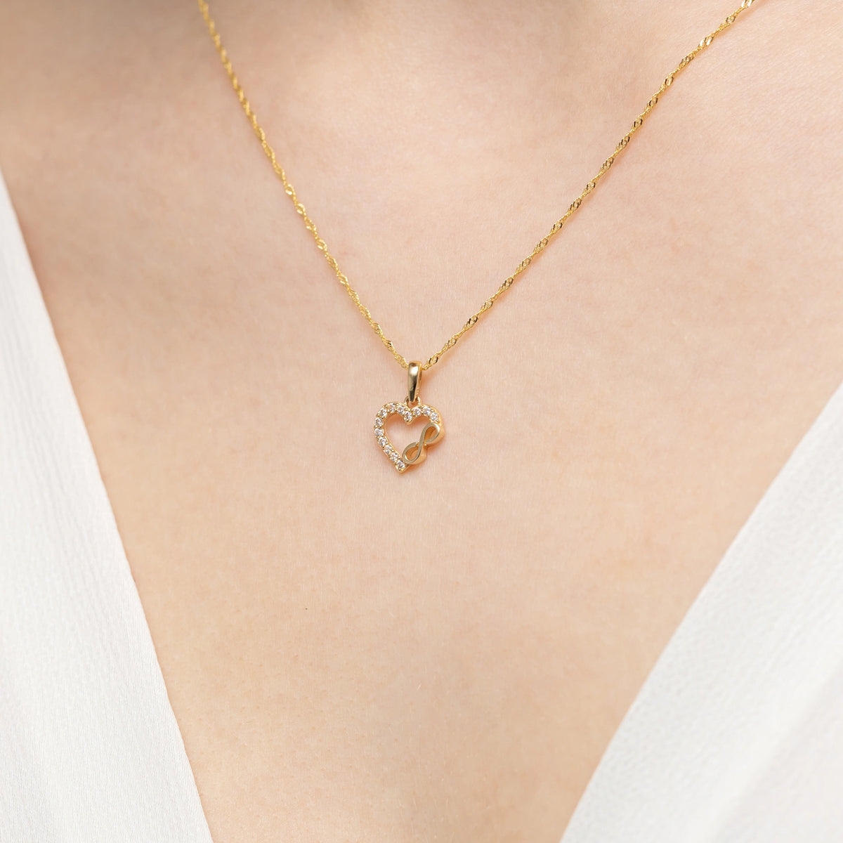 pendentif-en-or-bicolore-avec-trois-anneaux-z-gw-387-585