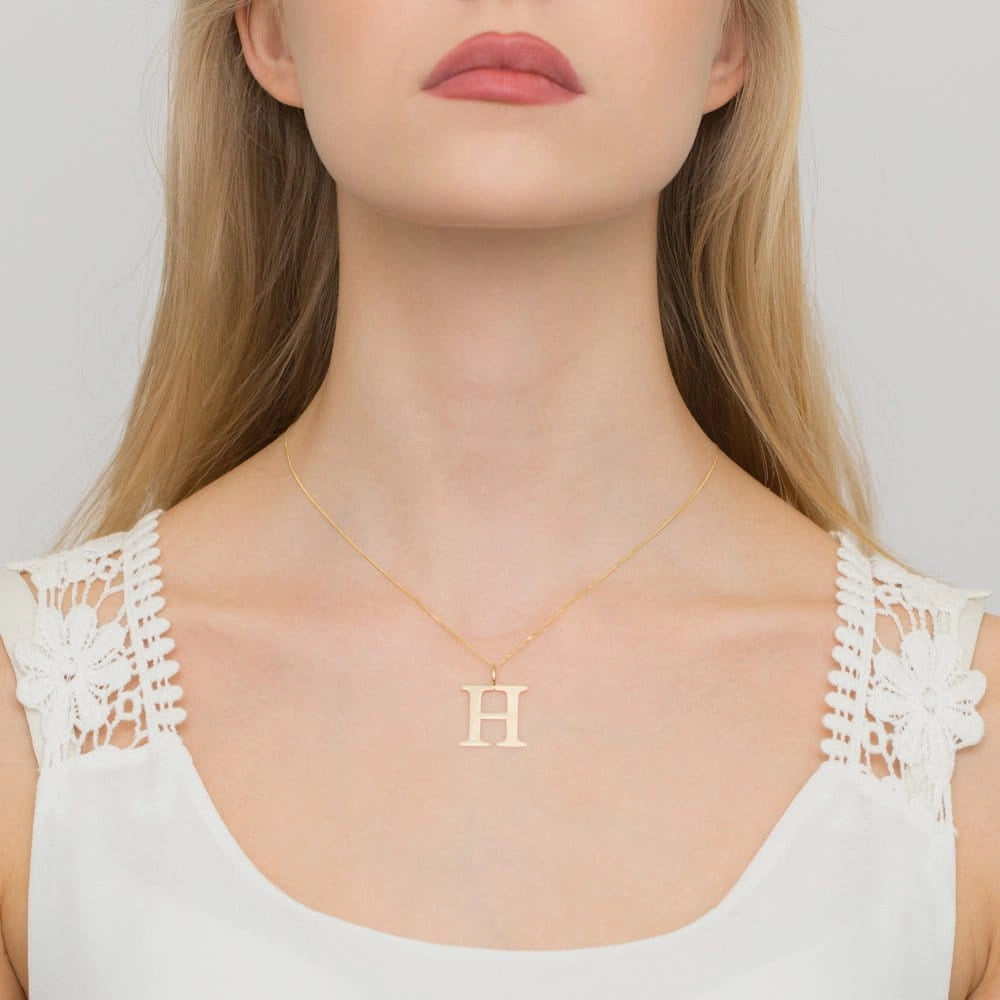 Großer Gelbgold-Anhänger mit Initiale „H“ und Diamant