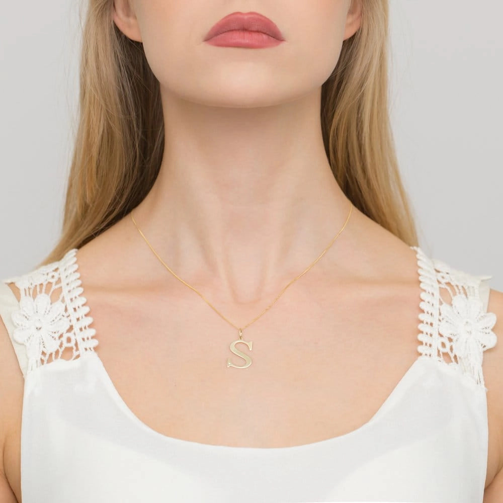 Großer Gelbgold-Anhänger mit Initiale „S“ und Diamant