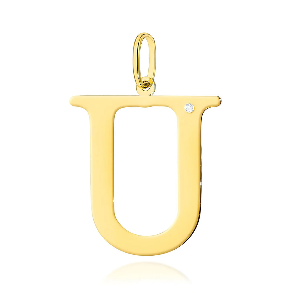 Veľký prívesok zo žltého zlata s iniciálou „U“ a diamantom