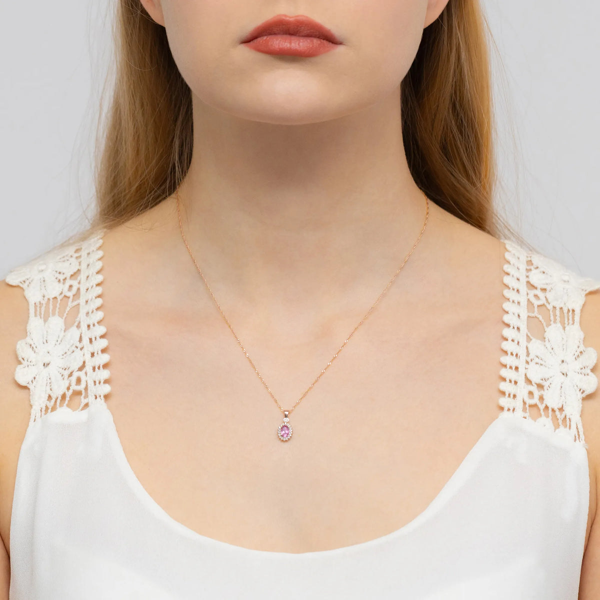 gold-pendant-with-0-50ct-pink-topaz-and-0-095ct-diamonds-z0312-top-01