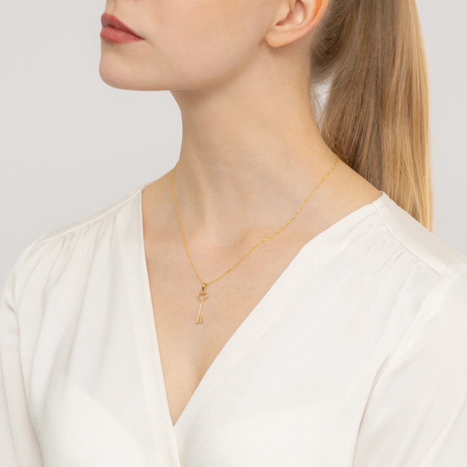 Zlatá súprava: prívesok kľúč so zirkónom