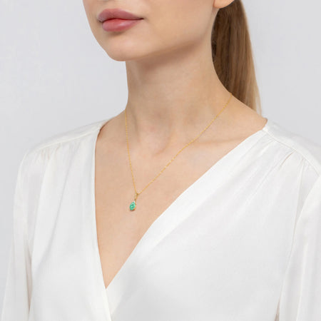 Pendant made of the 14K (585) gold. In our offer includes chains, pendants, necklaces. Oval cut emerald 0.80ct and 3 diamonds 0.026ct. Unique gift for her.