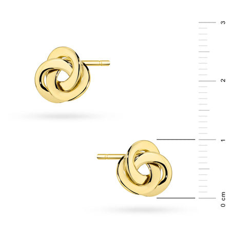 Ces boucles d'oreilles géométriques torsadées en or 14 carats sont un accessoire exclusif. Les boucles d'oreilles se ferment par une attache à clou. Elles sont présentées dans un écrin élégant, parfait pour un cadeau.