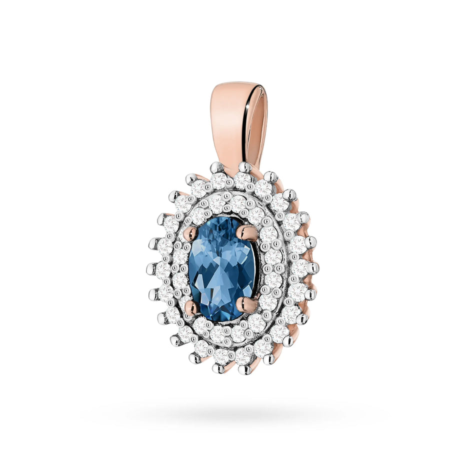 Prívesok zo 14K (585) zlata. Stredový topás london blue 0,50 ct obklopený 39 diamantmi 0,19 ct. Jedinečný darček pre ňu. Náš obchod ponúka retiazky a náhrdelníky