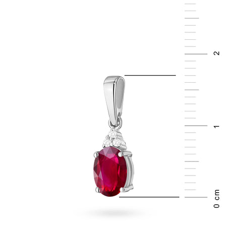 Pendentif en or 14 carats (585). Notre offre comprend des chaînes, des pendentifs, des colliers. Rubis central taillé en ovale de 1,00 ct et 3 diamants de 0,026 ct. Cadeau unique parfait.